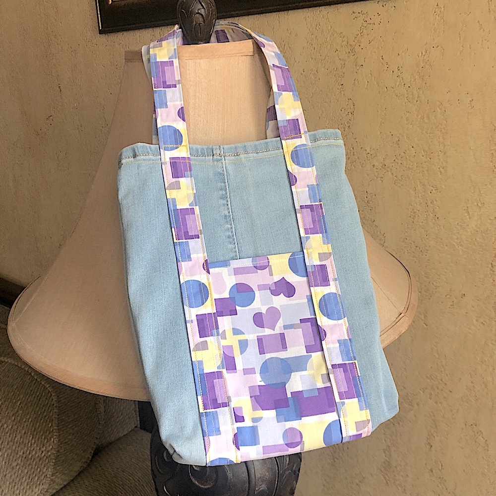 Upcycled mini jeans tote. Light blue with geometric heart shapes